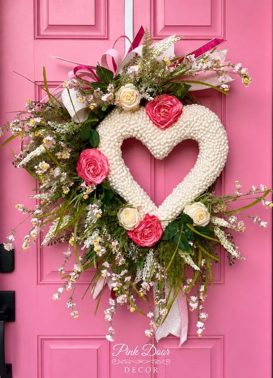 Pearl heart wreath with pink and cream roses on the pink door